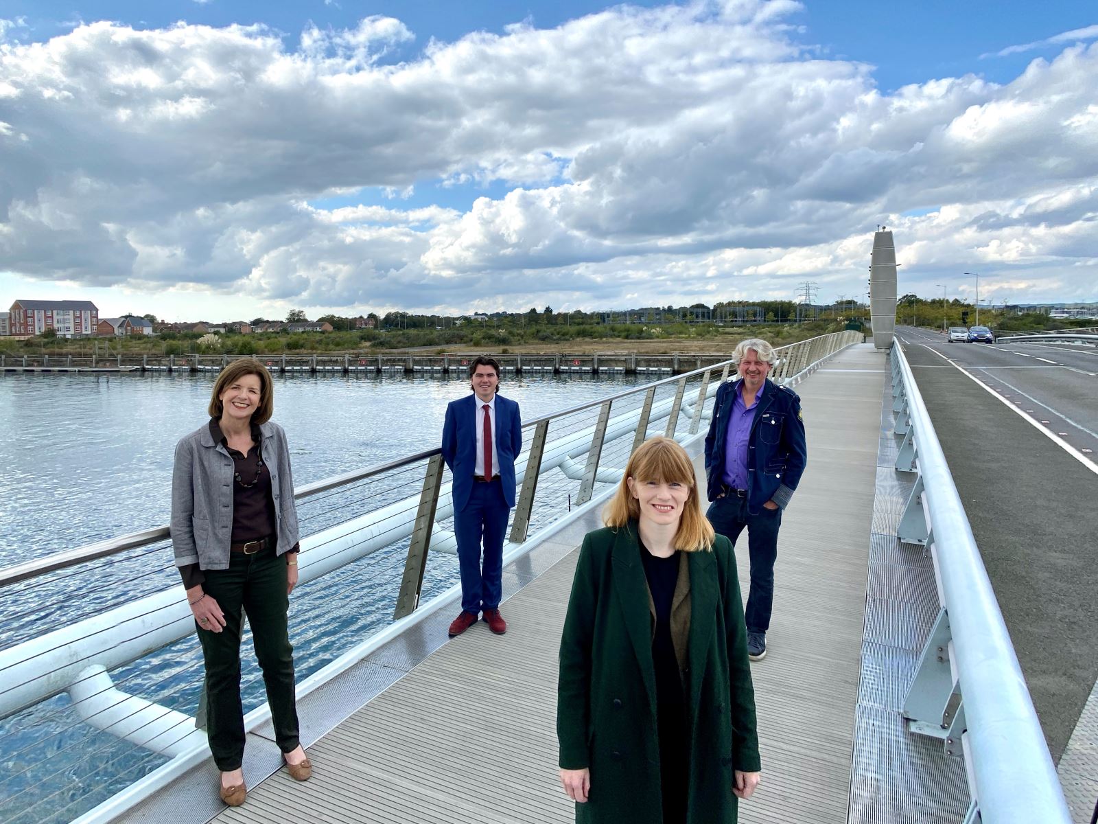 Holes Bay, L-R Sara Uzzell Deputy Chair Dorset LEP, Councillor Kieron Wilson BCP Council Portfolio Holder for Housing, Lorna Carver Dorset LEP Director and Councillor Mark Howell Portfolio Holder for Regeneration, Culture and Economy BCP Council.